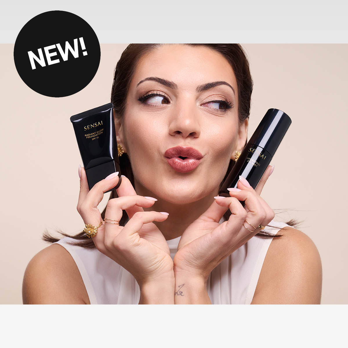 Sensai foundation och primer nyhet, luxury beauty smink för naturlig lyster, sticker med texten NEW!