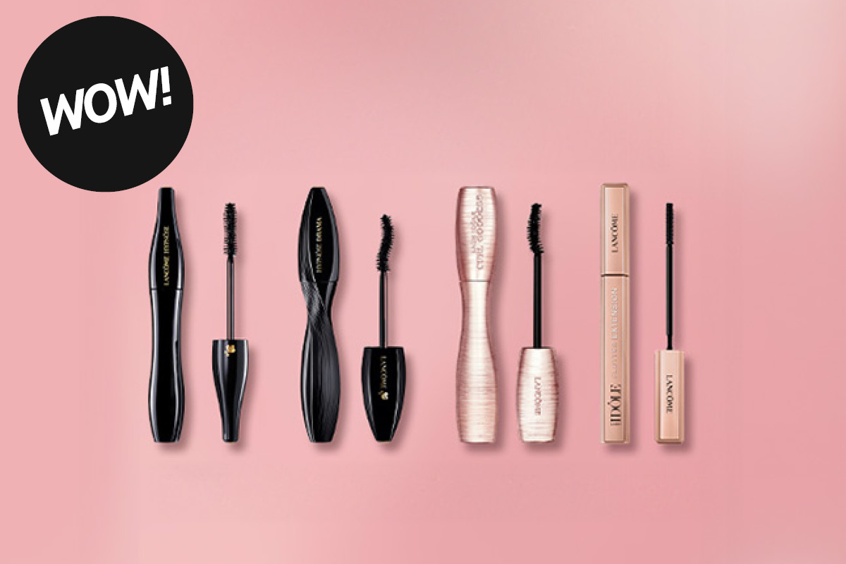 Flere mascaraer fra Lancôme i svart og lys rosa design med synlige børster, på rosa bakgrunn med en svart sirkel med teksten “WOW!”.