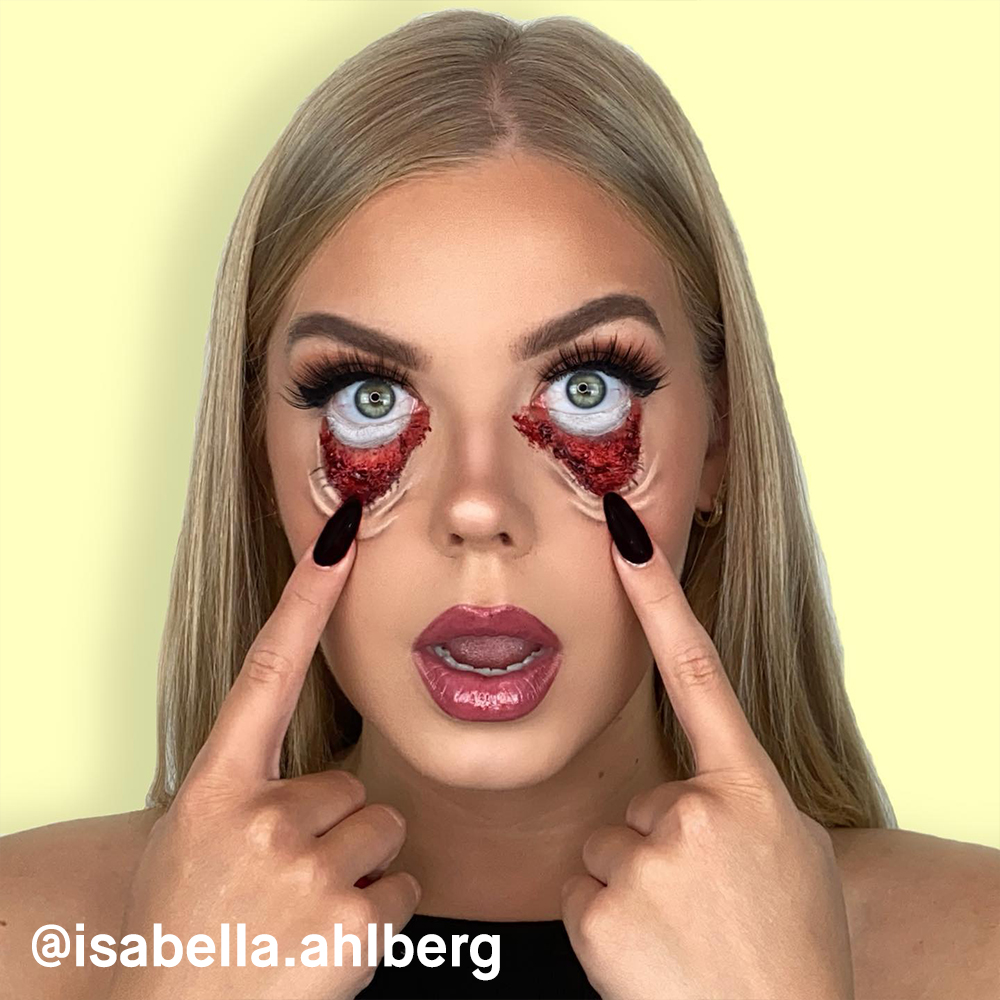 @isabella.Ahlberg pelottavassa Halloween-meikissä silmien ympärillä.