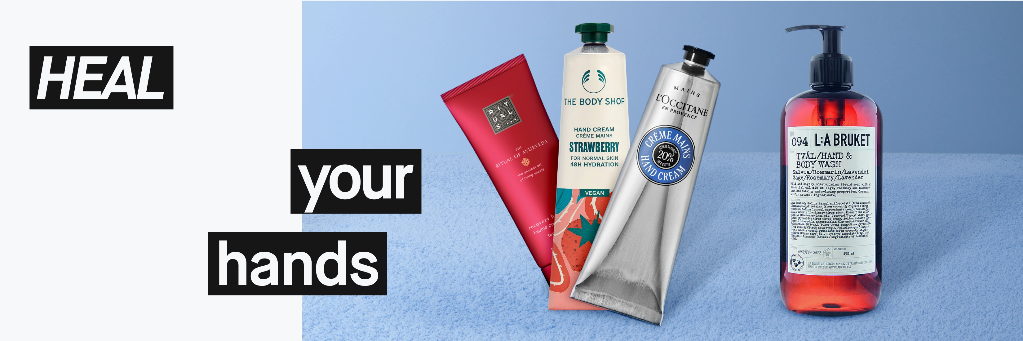 Kampanjakuva, jossa näkyy teksti “HEAL your hands”. Rituals-, The Body Shop-, L’Occitane- ja L:A Bruket -käsienhoitotuotteita näkyy vaaleansinistä taustaa vasten.