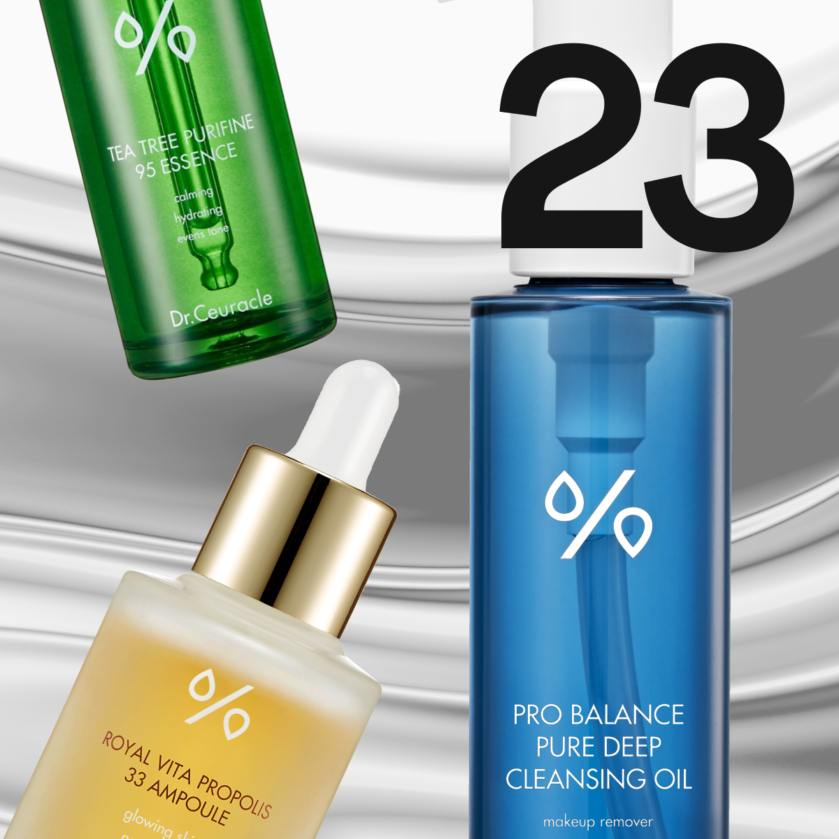 Kolme Dr. Ceuracle -pulloa kullansävyisessä, vihreässä ja sinisessä lasissa.