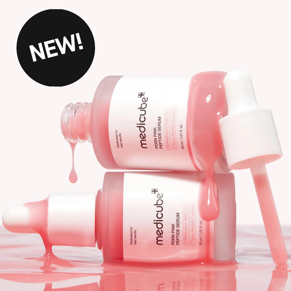 Medicube PDRN Pink Peptide Serum -seerumipulloja vaaleanpunaisella nesteellä.