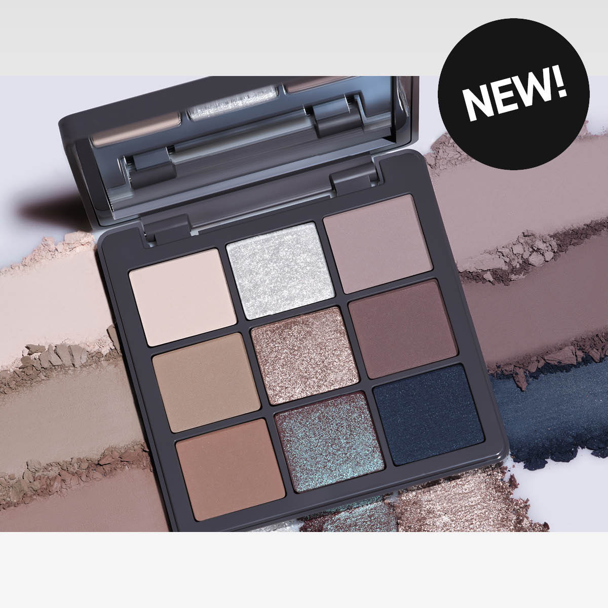 Yhdeksän sävyn luomiväripaletti, jossa on "NEW!" -merkintä.