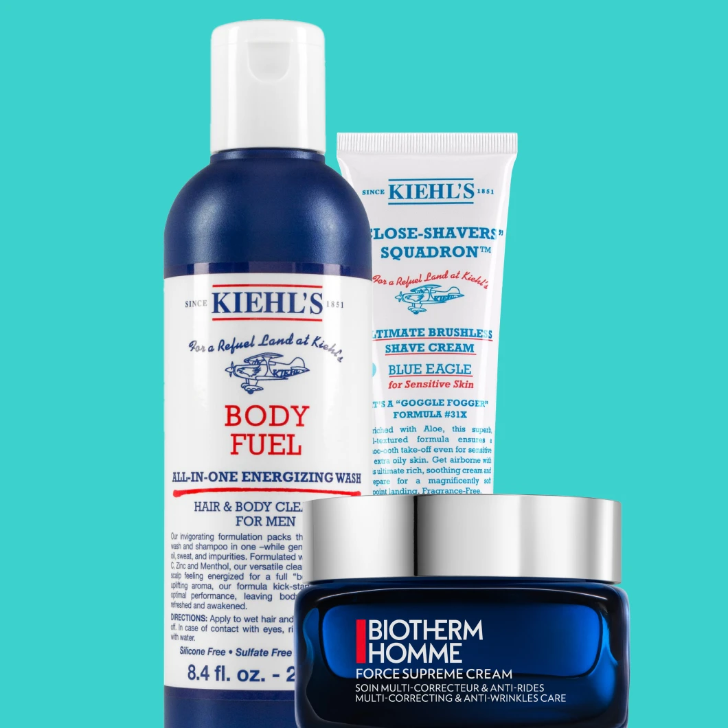 Kuva, joka näyttää kolme tuotetta: Kiehl's Body Fuel All-In-One Energizing Wash, Kiehl's Ultimate Brushless Shave Cream Blue Eagle for Sensitive Skin, ja Biotherm Homme Force Supreme Cream. Tausta on turkoosi.