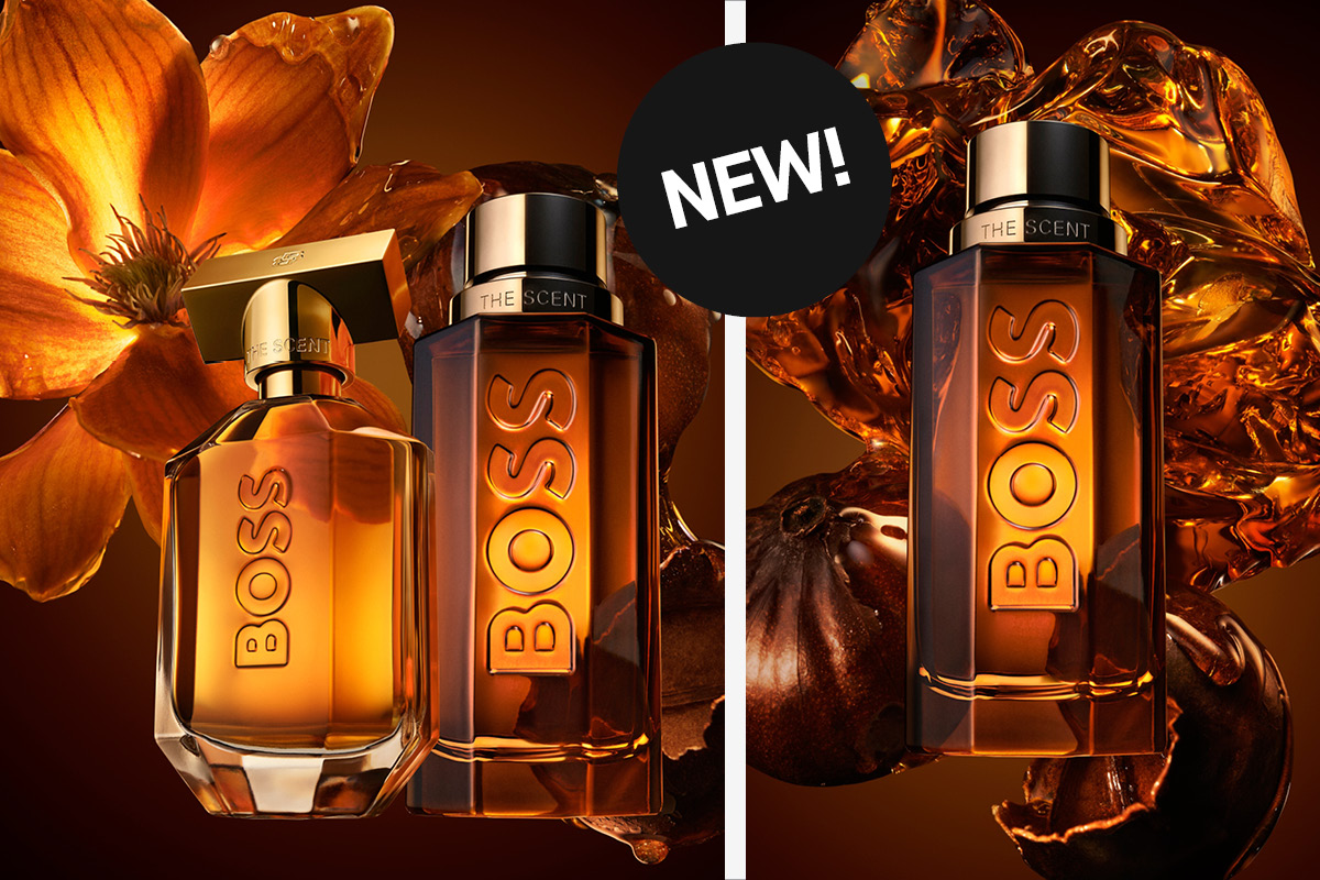 Kaksi Boss The Scent -hajuvesipulloa oranssin kukan edessä, NEW!-tekstillä