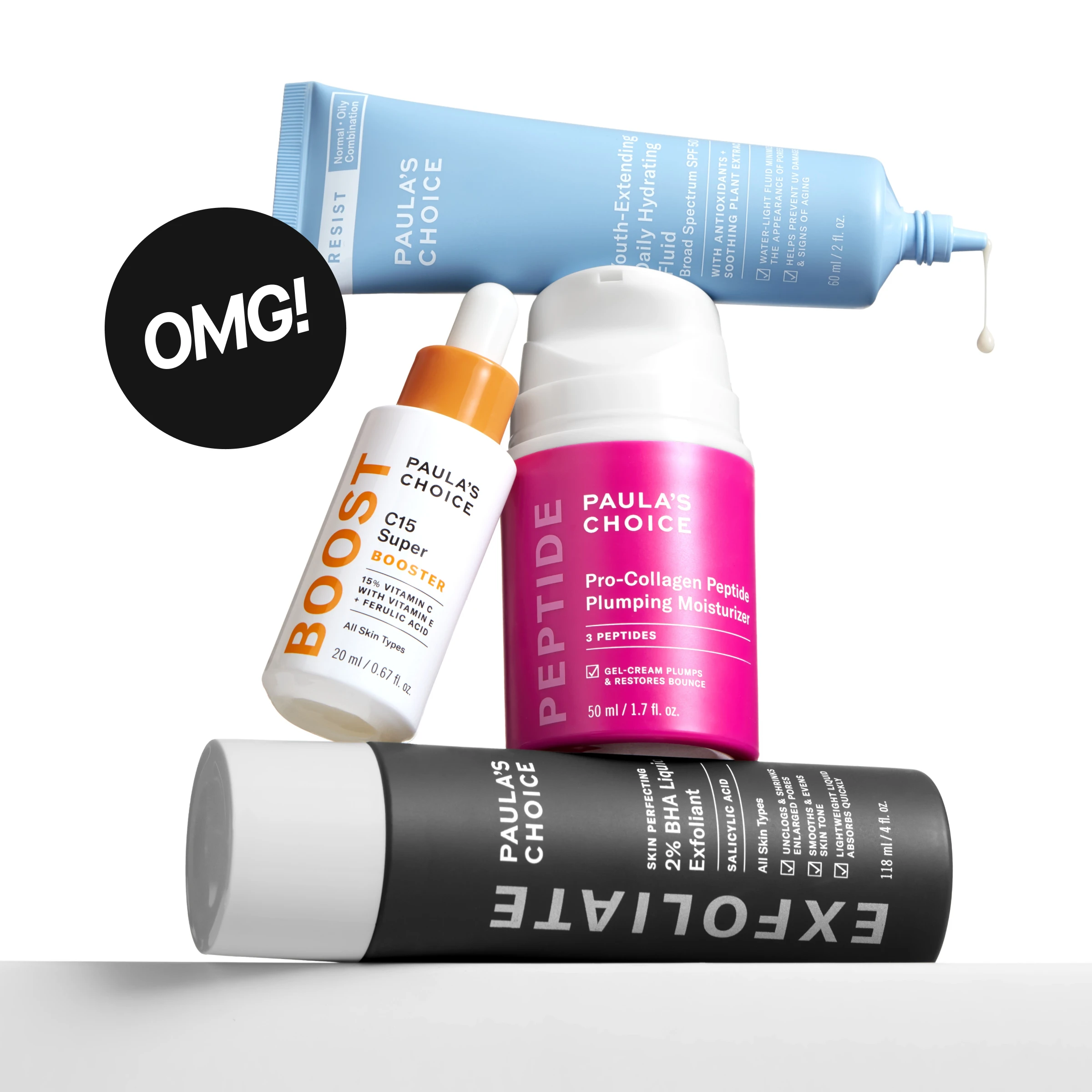 Hudvårdsprodukter från Paula’s Choice visas mot vit bakgrund, inklusive “C15 Super Booster”, “Pro-Collagen Peptide Plumping Moisturizer”, “2% BHA Liquid Exfoliant” och en blå tub med SPF, tillsammans med texten “OMG!”. Förpackningarna visar detaljer som ingredienser, volym och produktnamn.