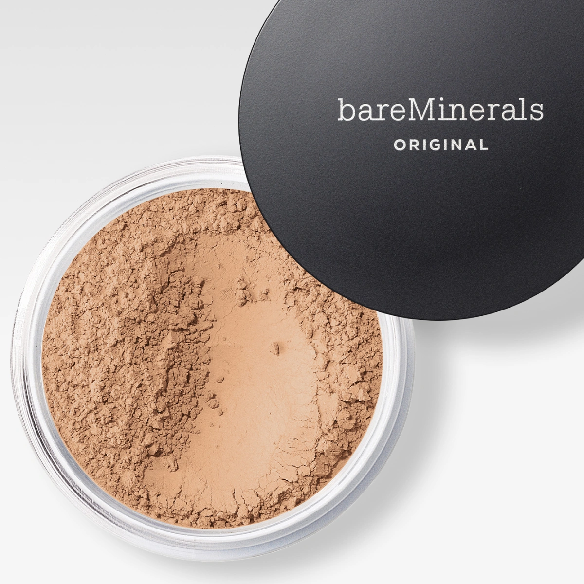bareMinerals Original løspudderfoundation i åpen krukke med synlig pudder og lokk med teksten "bareMinerals ORIGINAL".