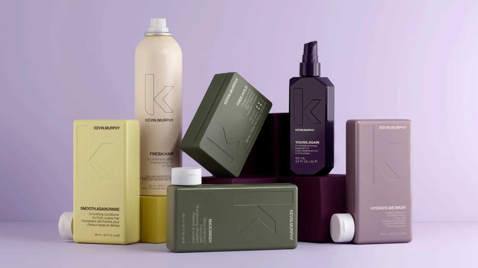 Urval av Kevin Murphy hårvårdsprodukter: balsam, torrschampo, stylingpasta, schampon och behandlingsolja.