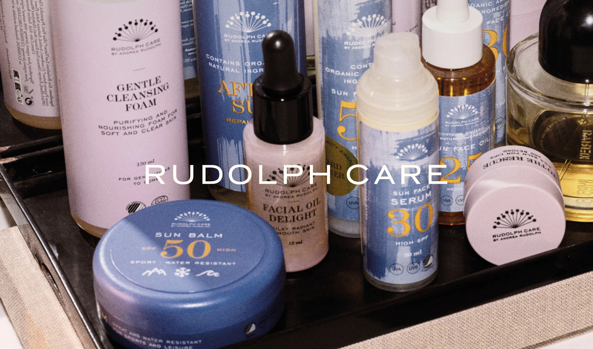 Rudolph Care hudvårdsprodukter: Gentle Cleansing Foam, Sun Balm SPF 50, Facial Oil Delight och Sun Face Serum SPF 30.