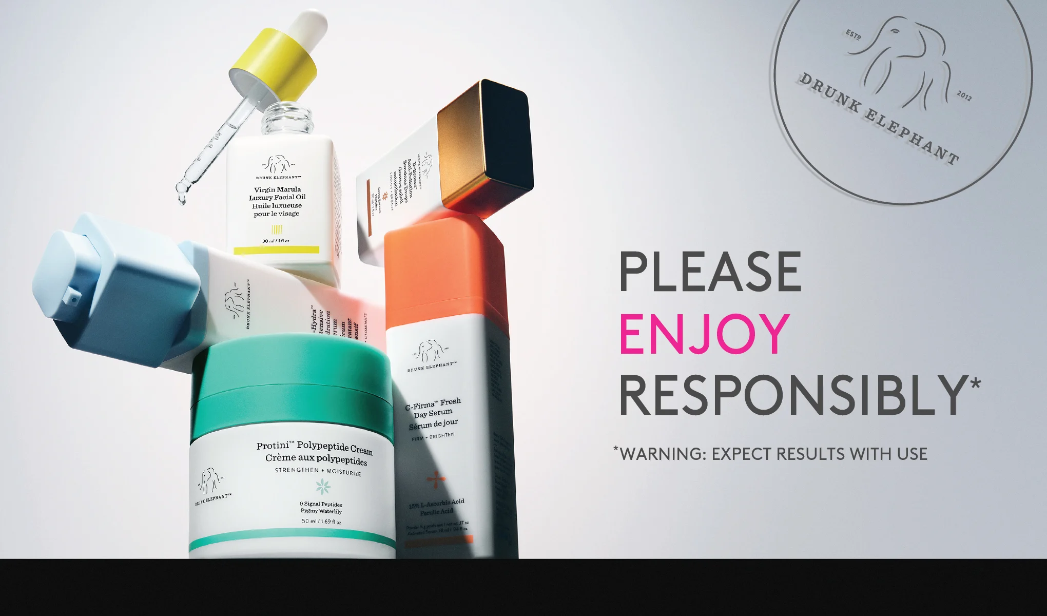 Drunk Elephant-hudpleieprodukter mot hvit bakgrunn ved siden av teksten «Please enjoy responsibly».