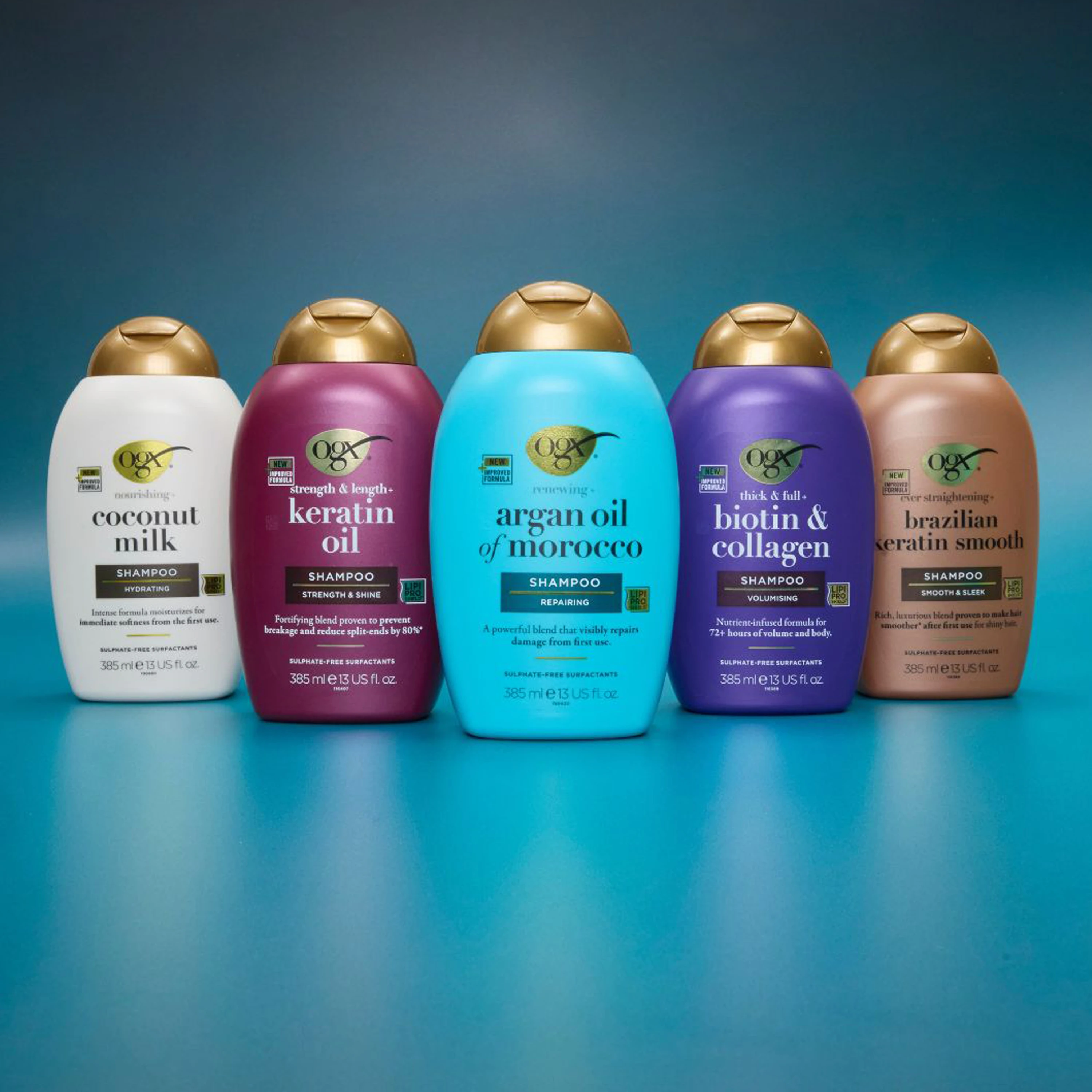 Fem OGX sjampoflasker i forskjellige farger: Coconut Milk, Keratin Oil, Argan Oil, Biotin & Collagen, og Brazilian Keratin.