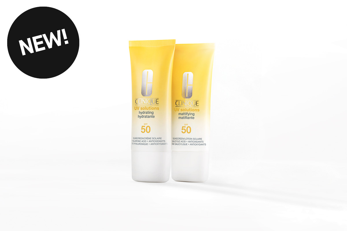 Kaksi Clinique-aurinkosuojatuotetta tekstillä “CLINIQUE UV solutions hydrating hydrante SPF 50” ja “CLINIQUE UV solutions mattifying matifiante SPF 50”. Tuotteet näkyvät keltaisissa tuubeissa vaaleaa taustaa vasten sekä pyöreä merkki tekstillä “NEW!”.