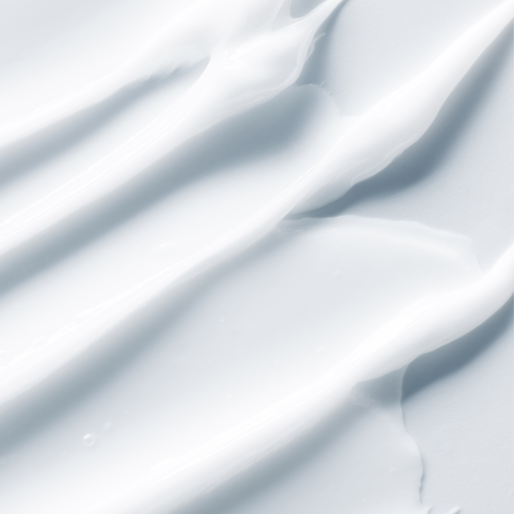 Närbild av en vit kräm med textur.