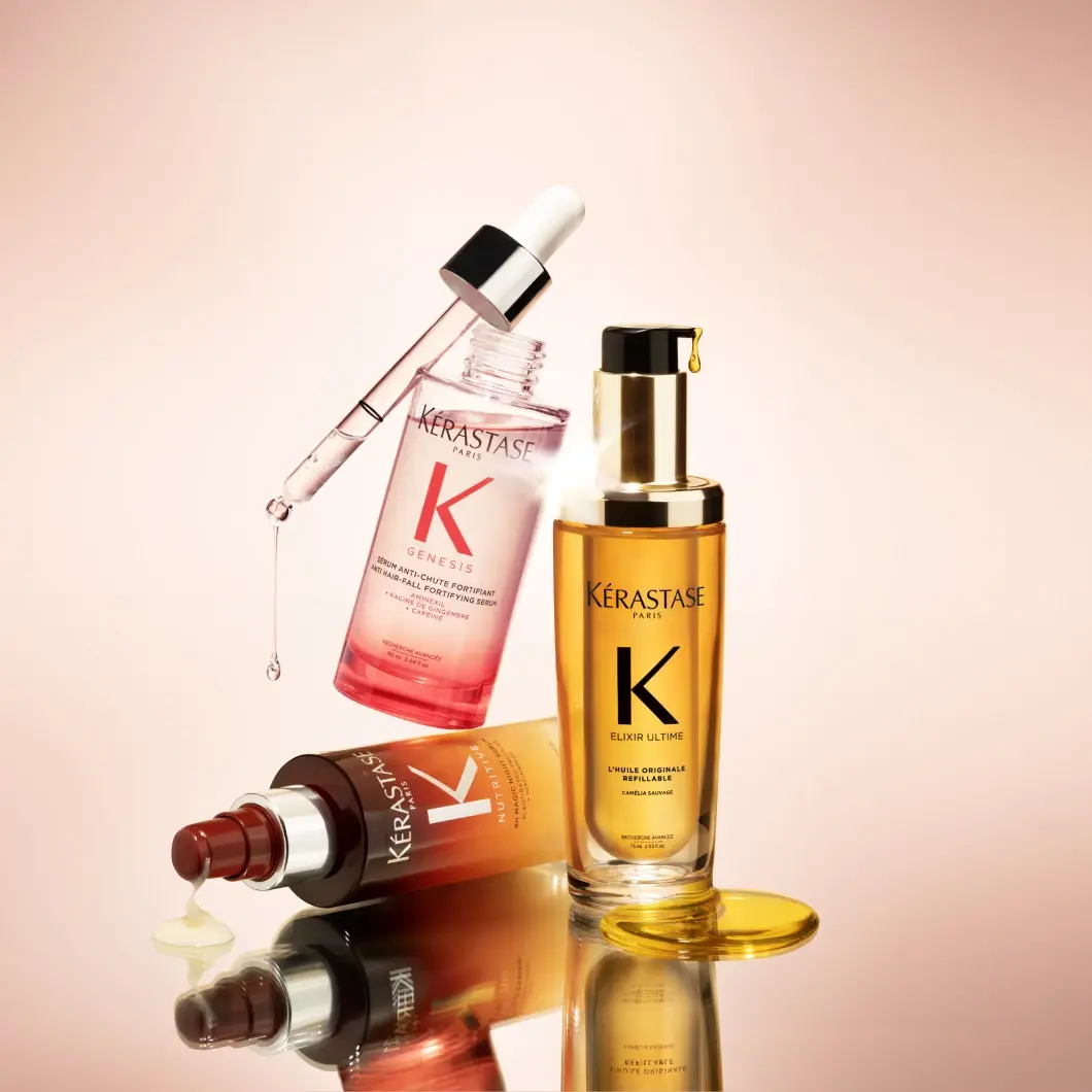 Tre Kérastase hårprodukter: Genesis håravfallsserum, Elixir Ultime olja och Nutritive spray.