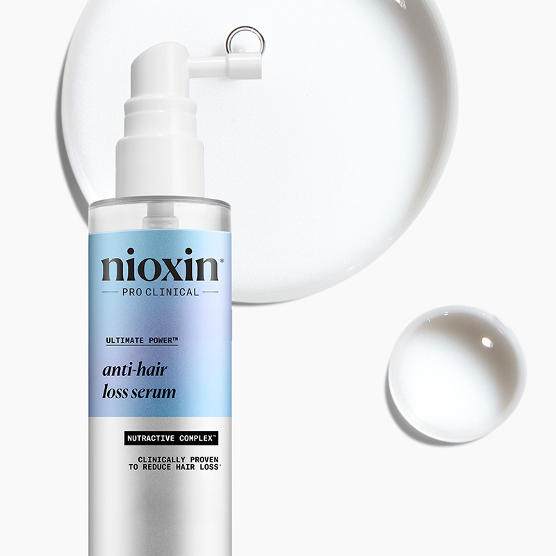 Nioxin Pro Clinical anti-hiustenlähtö seerumi, jossa on valkoinen pumppu ja sininen etiketti.