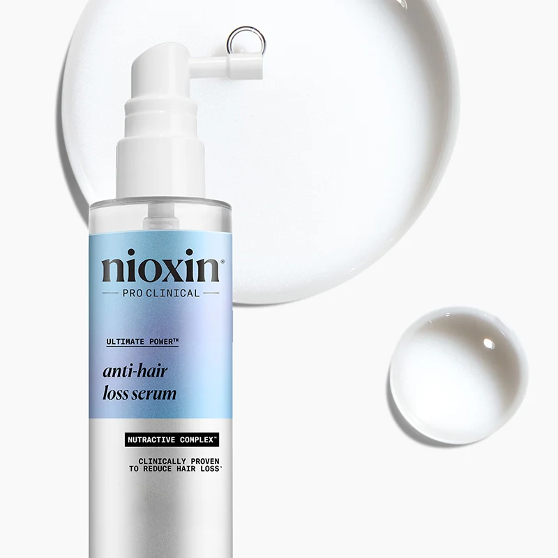 Nioxin Pro Clinical anti-hiustenlähtö seerumi, jossa on valkoinen pumppu ja sininen etiketti.