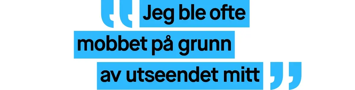 Bilde med et sitat skrevet i blå tekst. Sitatet lyder: ”Jeg ble ofte mobbet på grunn av utseendet mitt”.