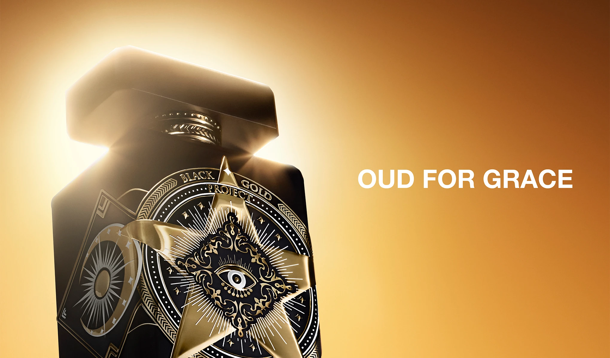Initio Oud for Greatness-parfymeflaske i gyllent lys.