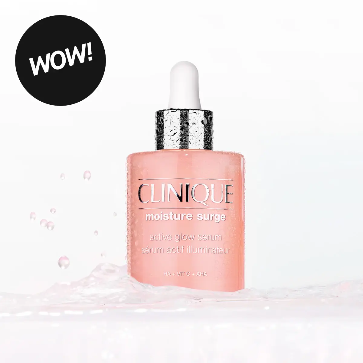 WOW! Clinique Moisture Surge Active Glow Serum, sérum actif illuminateur, HA + VIT C + AHA, i en rosa flaske med pipette og vanndråper.