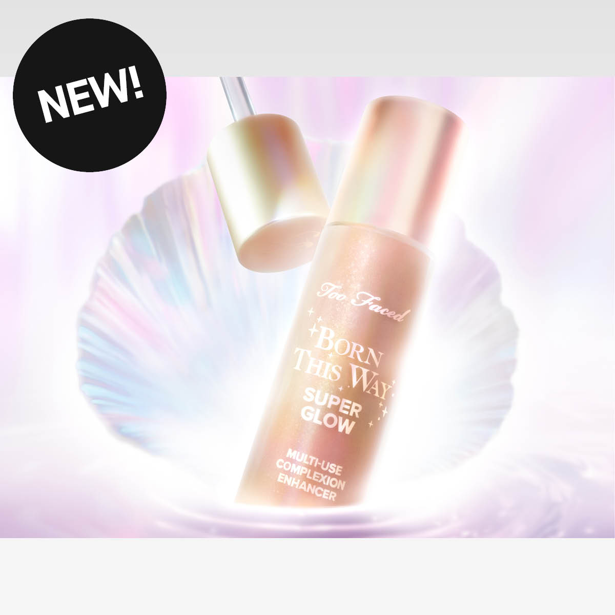 Too Faced Born This Way Super Glow -meikkituote hohtavalla taustalla.