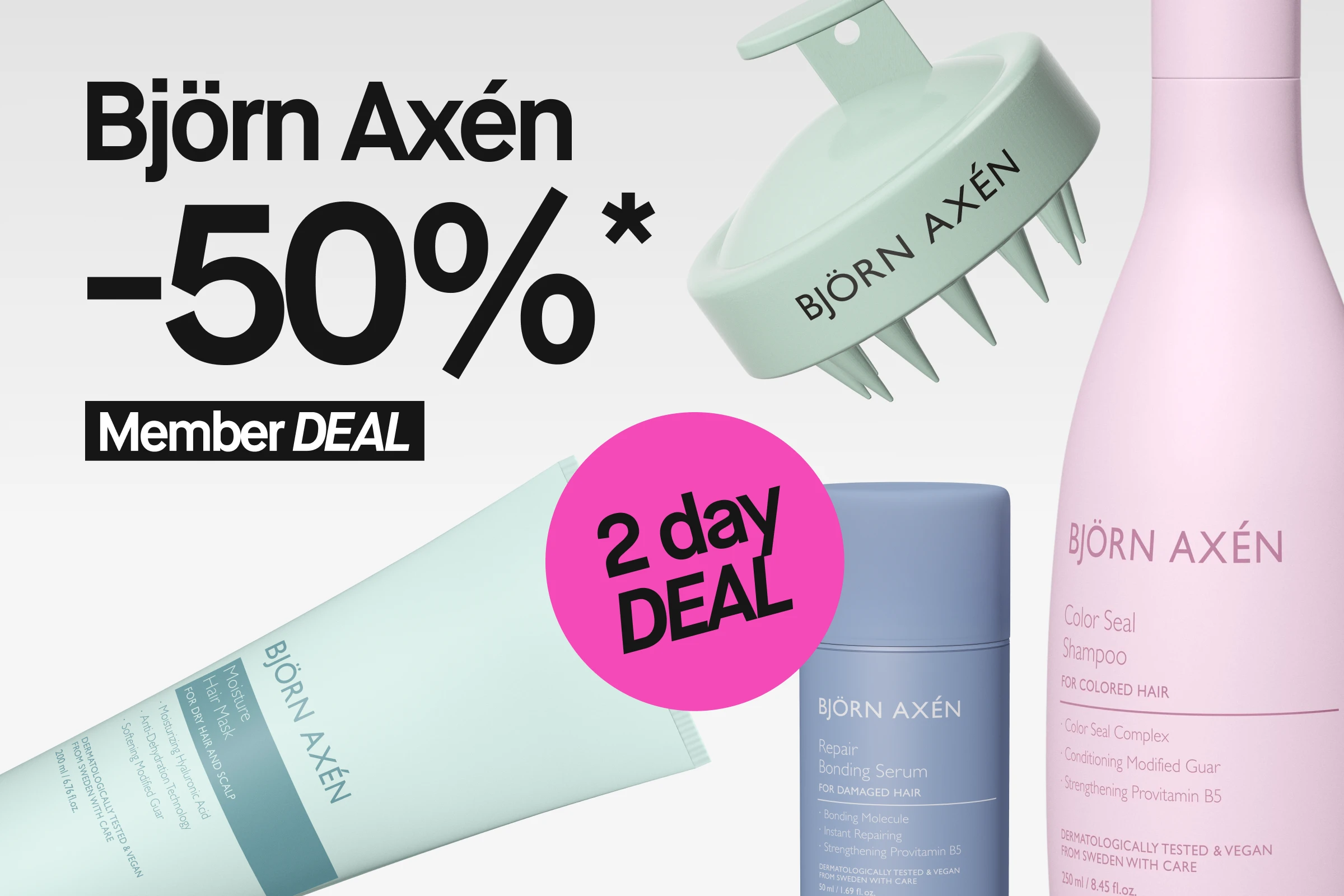 Kampanjakuva Björn Axén -hiustenhoitotuotteista vaaleaa taustaa vasten, mukana Color Seal Shampoo vaaleanpunaisessa pullossa, Moisture Hair Mask vaaleanvihreässä tuubissa, Repair Bonding Serum sinisessä pullossa sekä mintunvihreä hiuspohjaharja. Kuvassa näkyy tekstit ”Björn Axén 50%* Member DEAL” ja ”Unreal DEAL”.