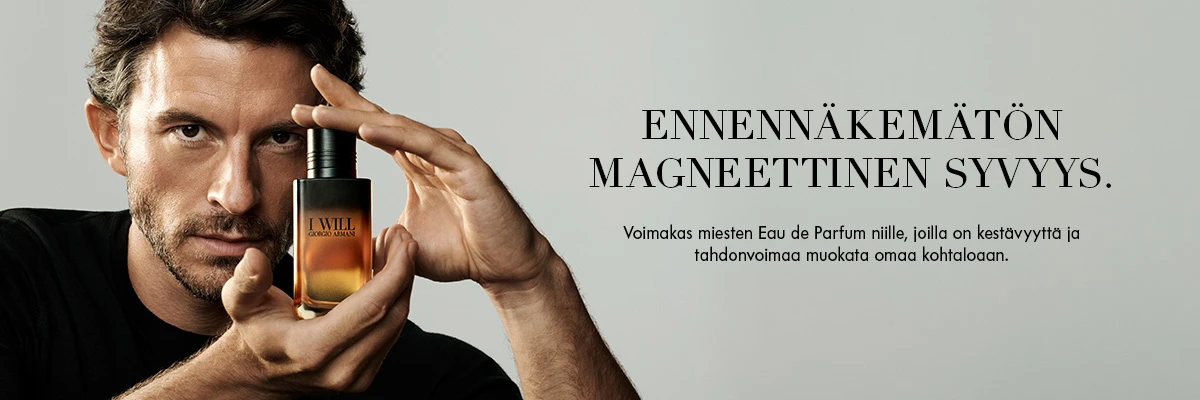 Mies pitelee Giorgio Armani I Will -tuoksupulloa. Teksti: ”Ennennäkemätöntä magneettista syvyyttä. Voimakas Eau de Parfum miehelle, jolla on rohkeutta ja tahdonvoimaa muovata oma kohtalonsa.”