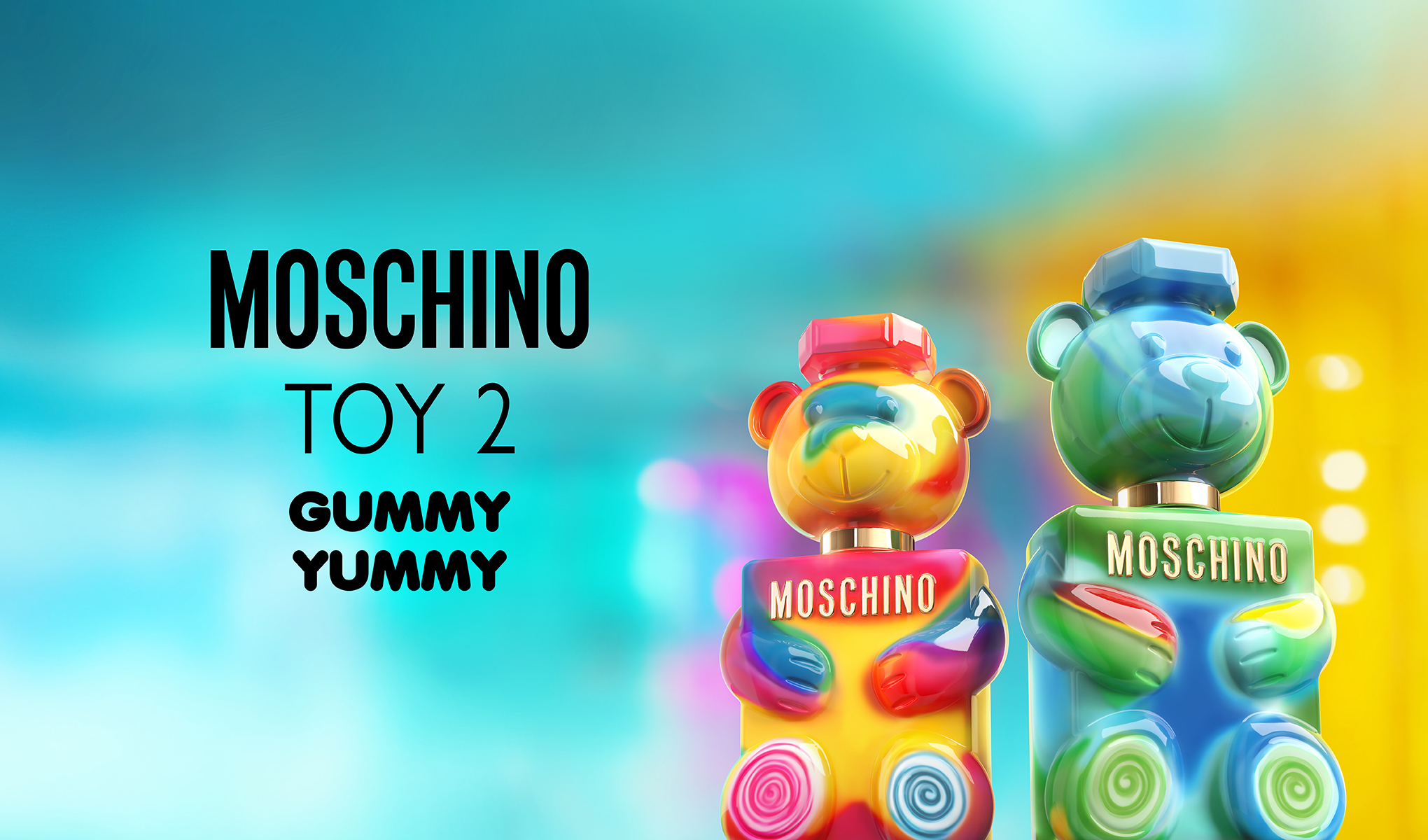 Värikäs Moschino Toy 2 -hajuvesimainos, jossa kaksi nallekarhun muotoista pulloa kirkkaissa sateenkaaren väreissä.