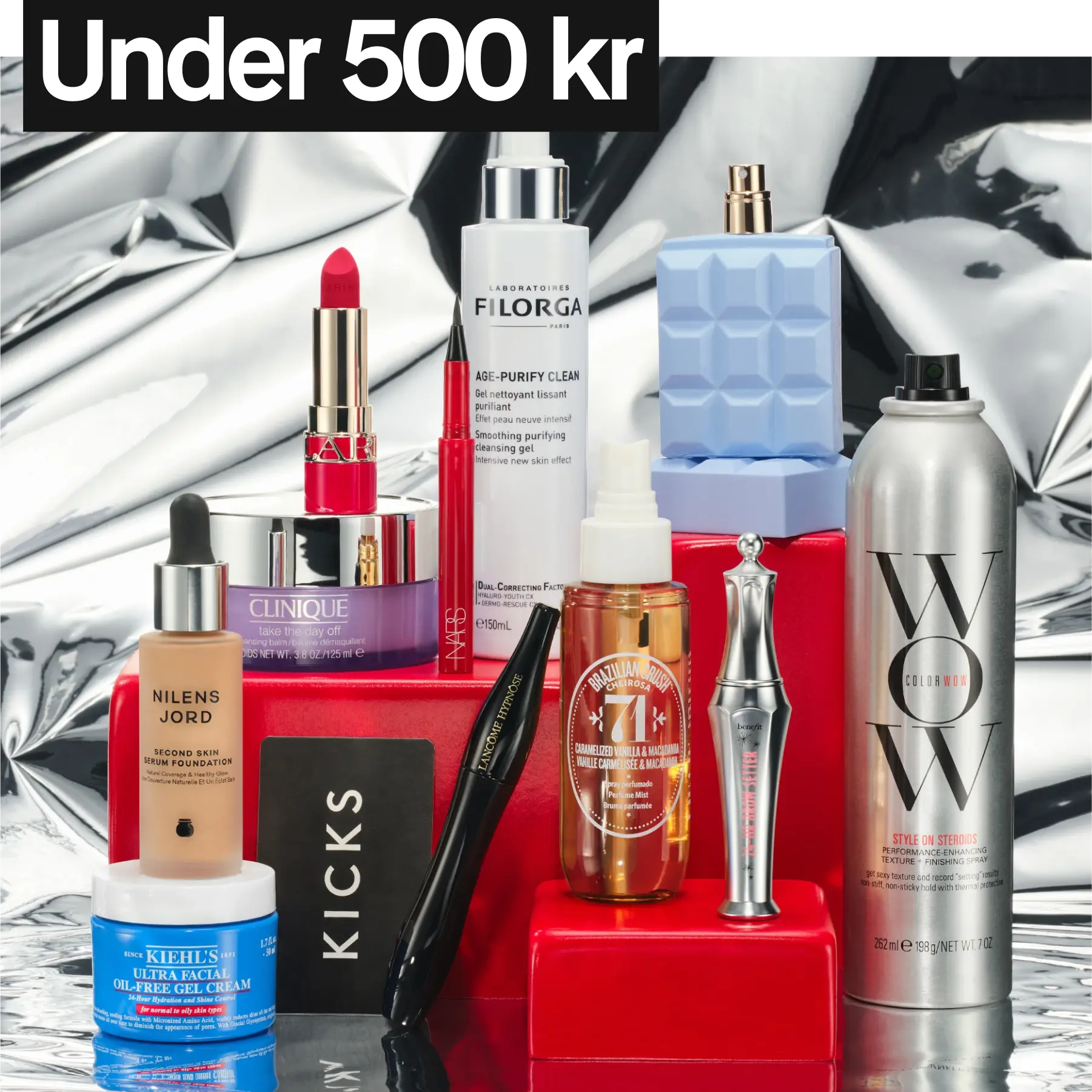 Julklappar under 500 mot silvrig bakgrund.