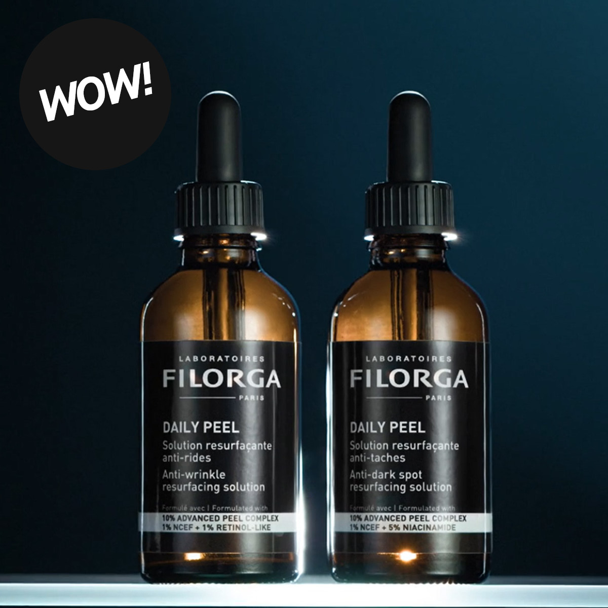 Kaksi ruskeaa Filorga “Daily Peel” -pulloa, joissa tekstit “Anti-wrinkle resurfacing solution” ja “Anti-dark spot resurfacing solution”, sekä musta ympyrä tekstillä “WOW!”.