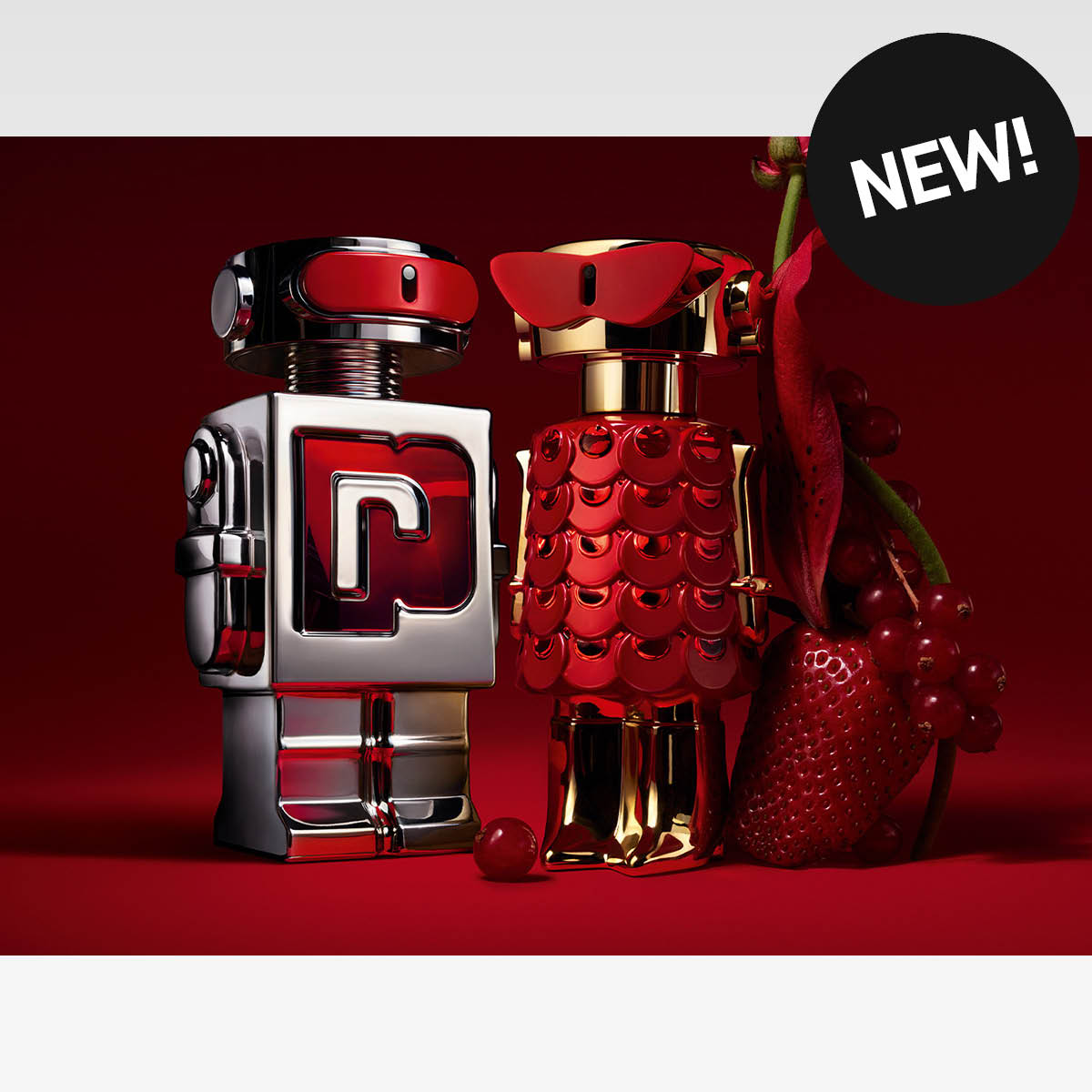 Två parfymflaskor formade som robotar mot röd bakgrund, med texten NEW!