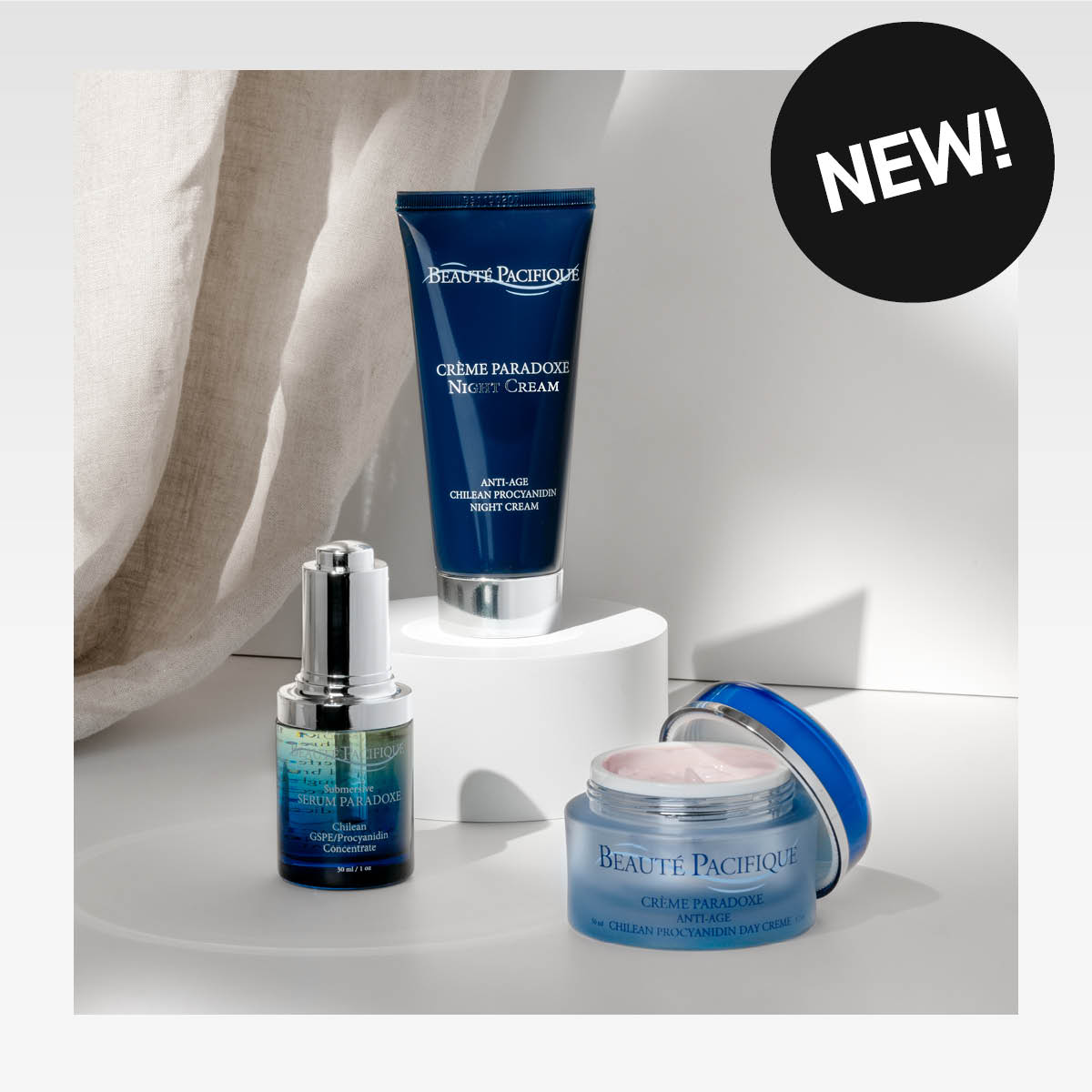 Kolme Beauté Pacifique -tuotetta valkoista taustaa vasten. Musta tarra tekstillä "NEW!"