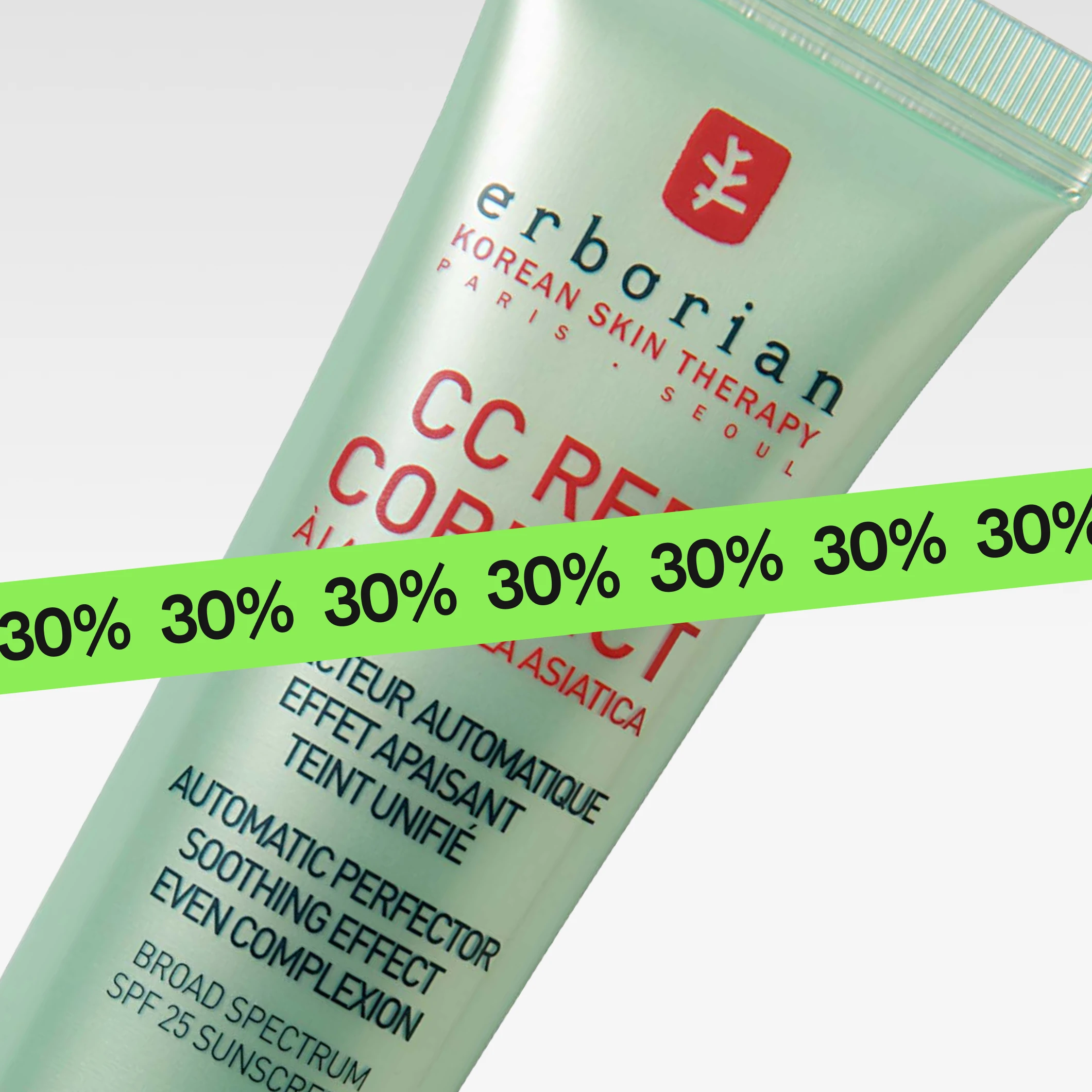 Nærbilde av Erborian “CC Red Correct” foundation med teksten “Korean Skin Therapy”, “CC Red Correct À la Centella Asiatica”, “Automatic Perfector Soothing Effect Even Complexion” og “Broad Spectrum SPF 25 Sunscreen”, med en grønn “30%”-banner over.