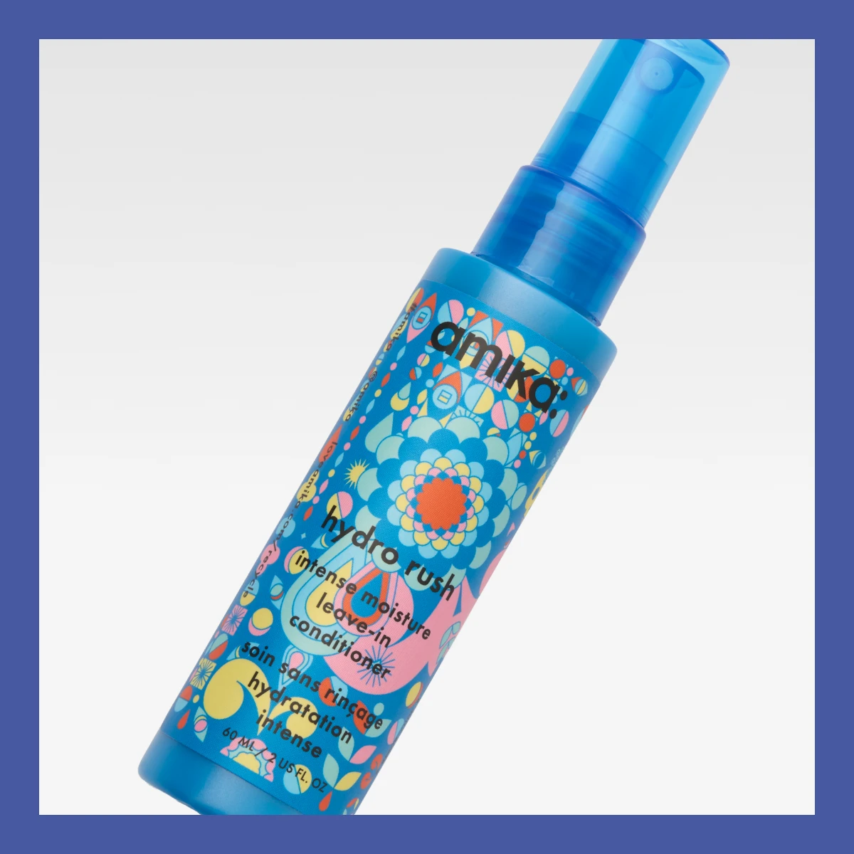 Amika Hydro Rush -hoitoaine sinisessä, värikkäässä pullossa.
