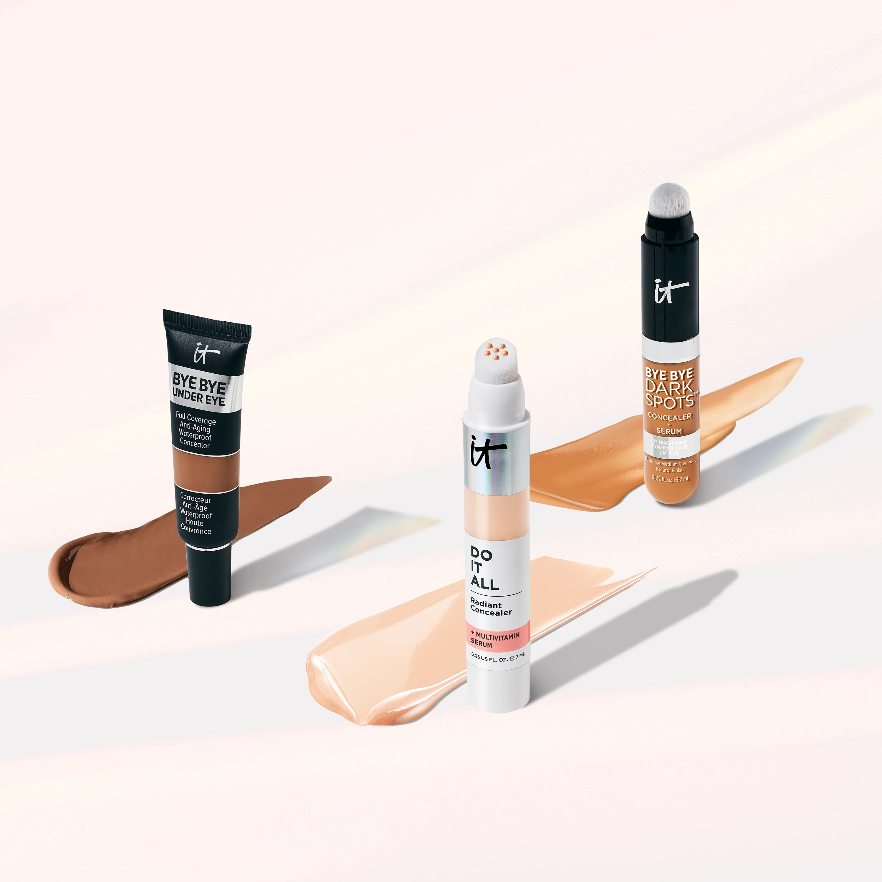 Tre iT Cosmetics -concealers i olika nyanser: Bye Bye Under Eye, Do It All och Bye Bye Dark Spots.