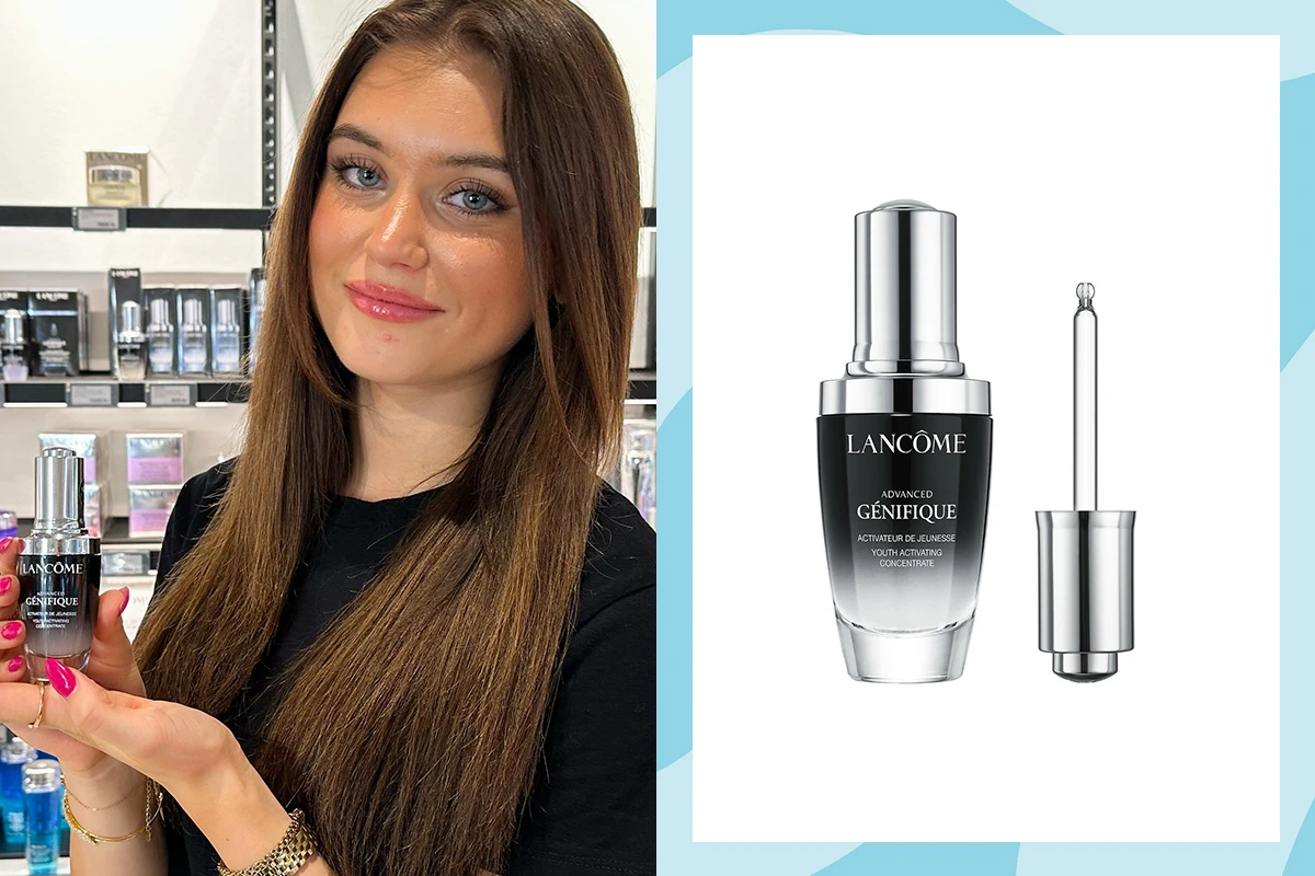  KICKS-työntekijä esittelee Lancôme Advanced Génifique -seerumia myymälässä, tuotekuva vieressä.