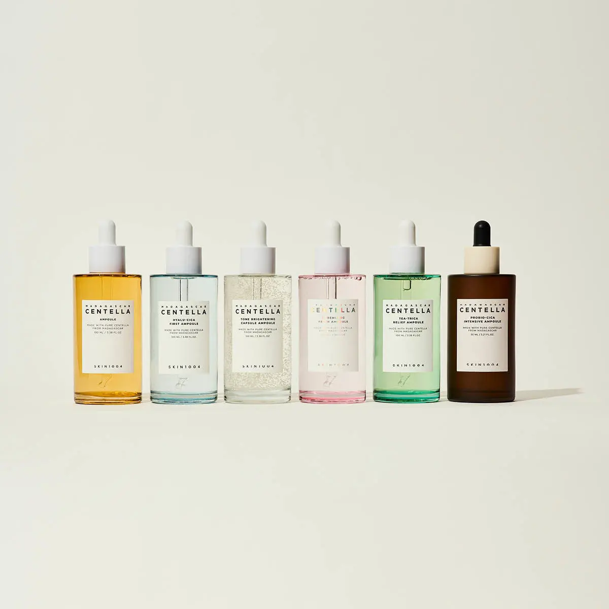 Seks SKIN1004 Madagascar Centella ampulleflasker: Original, Hyalu-Cica, Tone Brightening, P&C, Tea-Trica og Probio-Cica.