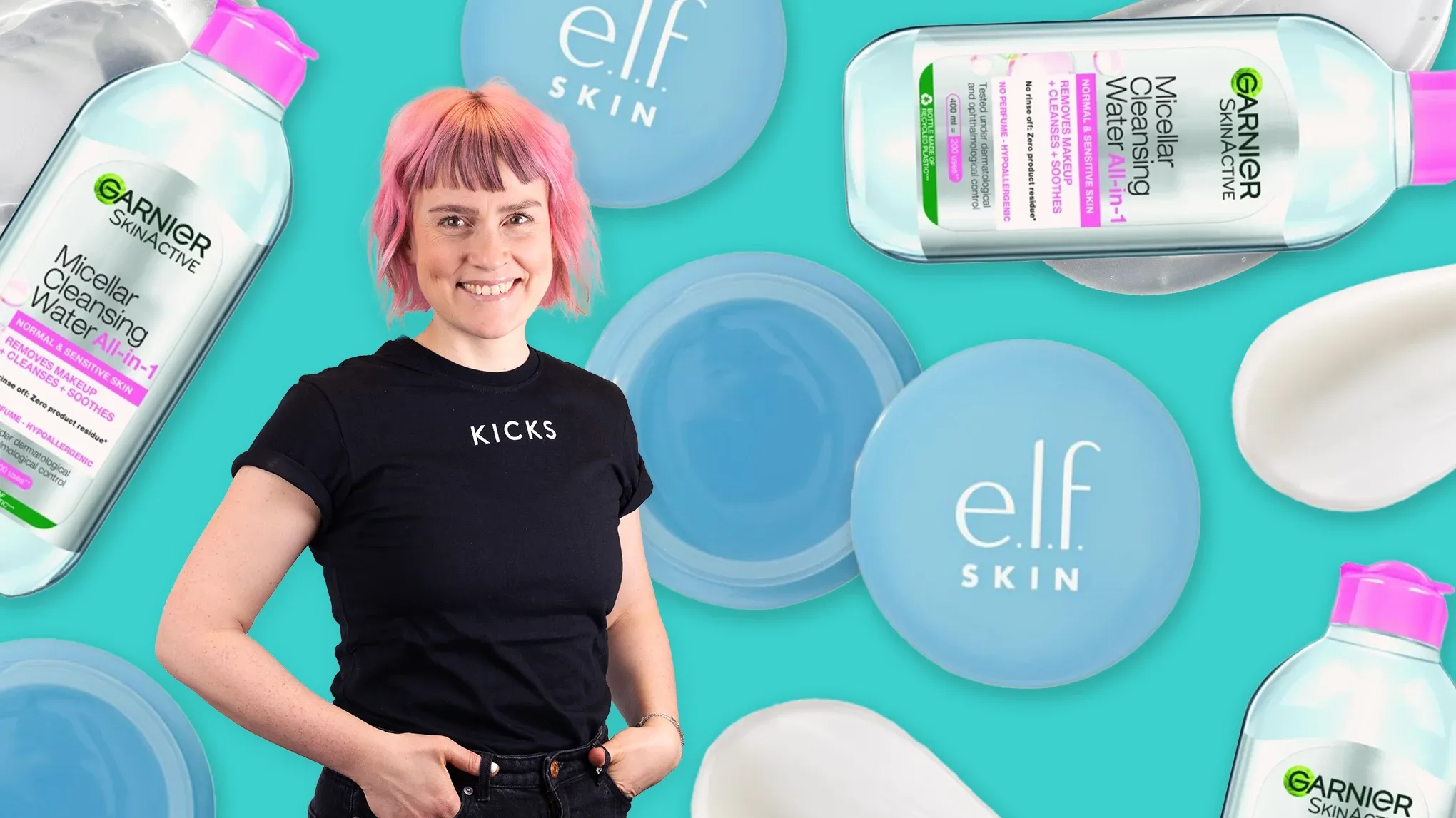 En person med rosa hår og en svart t-skjorte med teksten "KICKS" står foran en bakgrunn med produkter fra Garnier og e.l.f. Skin.