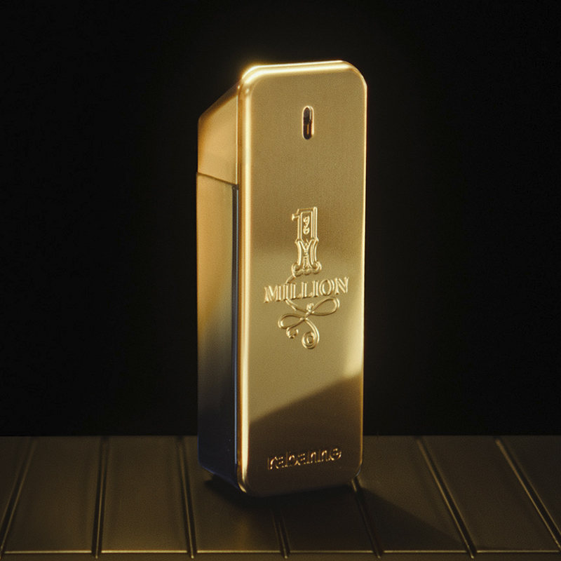 Parfyymi Million Gold mustaa taustaa vasten.