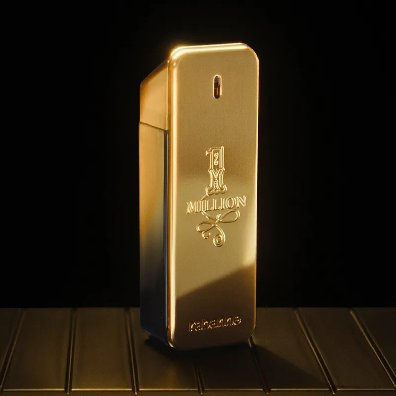 Parfyymi Million Gold mustaa taustaa vasten.