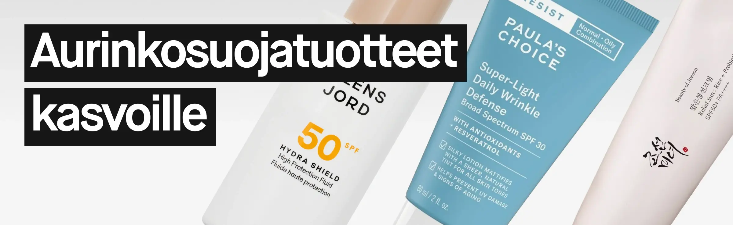 Useita kasvojen aurinkosuojatuotteita nojaamassa toisiinsa, muun muassa La Roche-Posay Anthelios SPF50+ ja Nilens Jord Hydra Shield SPF50, vaaleaa taustaa vasten.