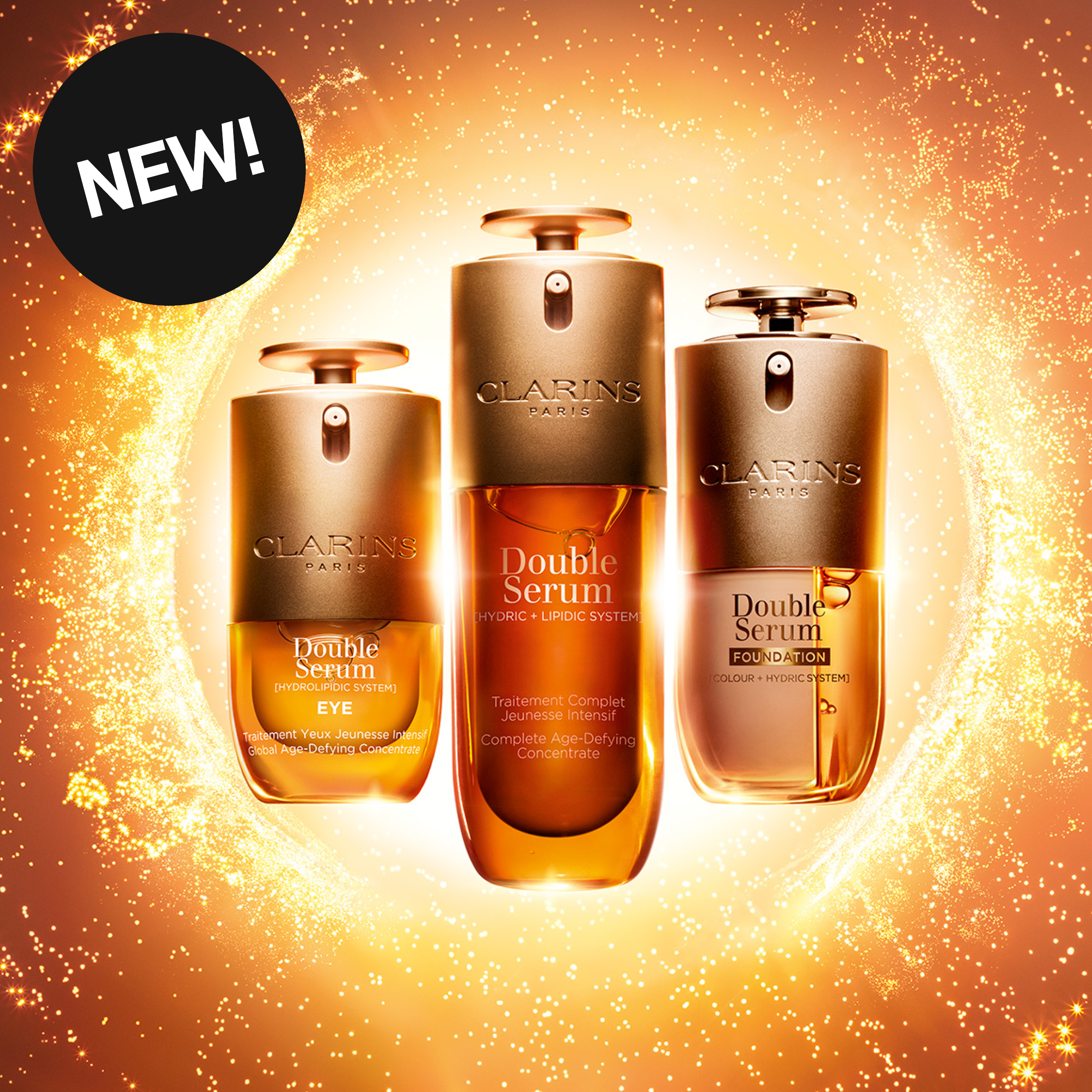 NYHET! Tre Clarins Double Serum-produkter i gyllene flaskor: Eye, Complete Age-Defying Concentrate och Foundation.