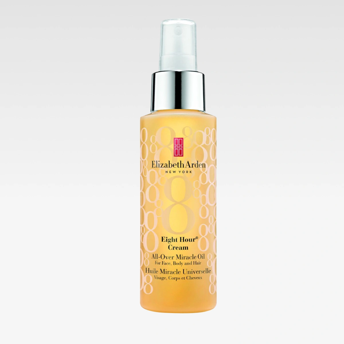 Gullfarget flaske fra Elizabeth Arden med teksten “Eight Hour Cream All-Over Miracle Oil for Face, Body and Hair”. Merket “Elizabeth Arden New York”.