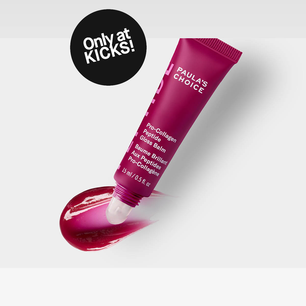 Paula’s Choice Pro-Collagen Peptide Gloss Balm pinkki huulikiilto kiiltävällä pinnalla vaalealla taustalla.