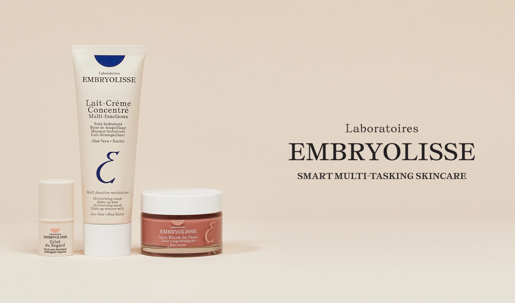 Kolme Laboratoires Embryolissen ihonhoitotuotetta beigeä taustaa vasten ja teksti ”Laboratoires Embryolisse Smart Multi-Tasking Skincare” tuotteiden oikealla puolella.