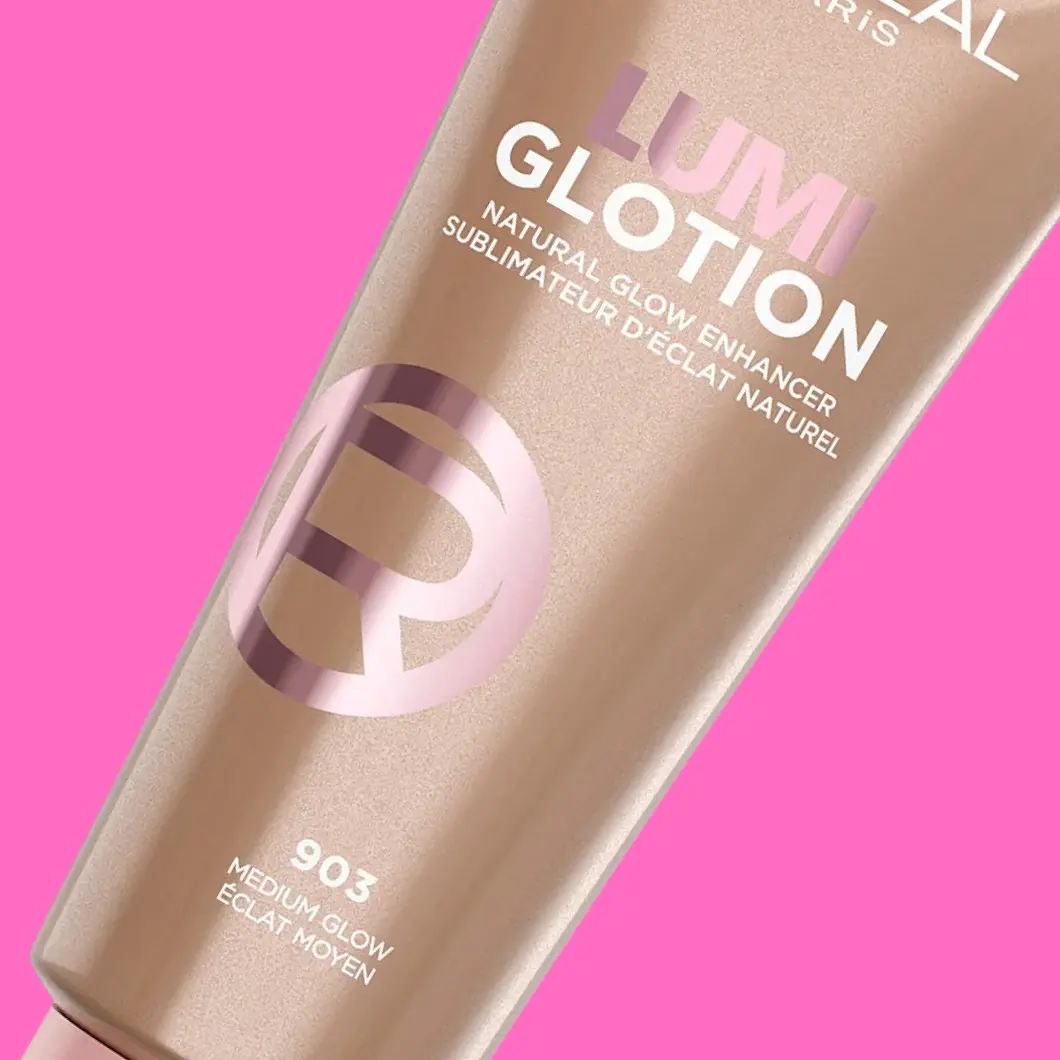 L'Oréal Lumi Glotion Natural Glow Enhancer, sävy 903 Medium Glow, vaaleanruskeassa tuubissa.