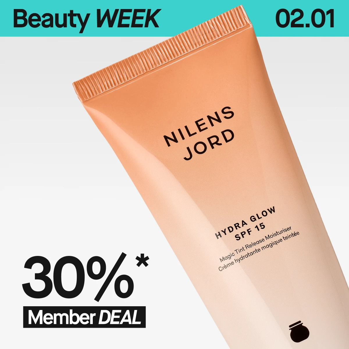 En nærbilde av Nilens Jord Hydra Glow SPF 15 i en beige tube mot lys bakgrunn. Øverst vises en turkis banner med “Beauty WEEK” og 2/1. Nederst står det “30%* Member DEAL”