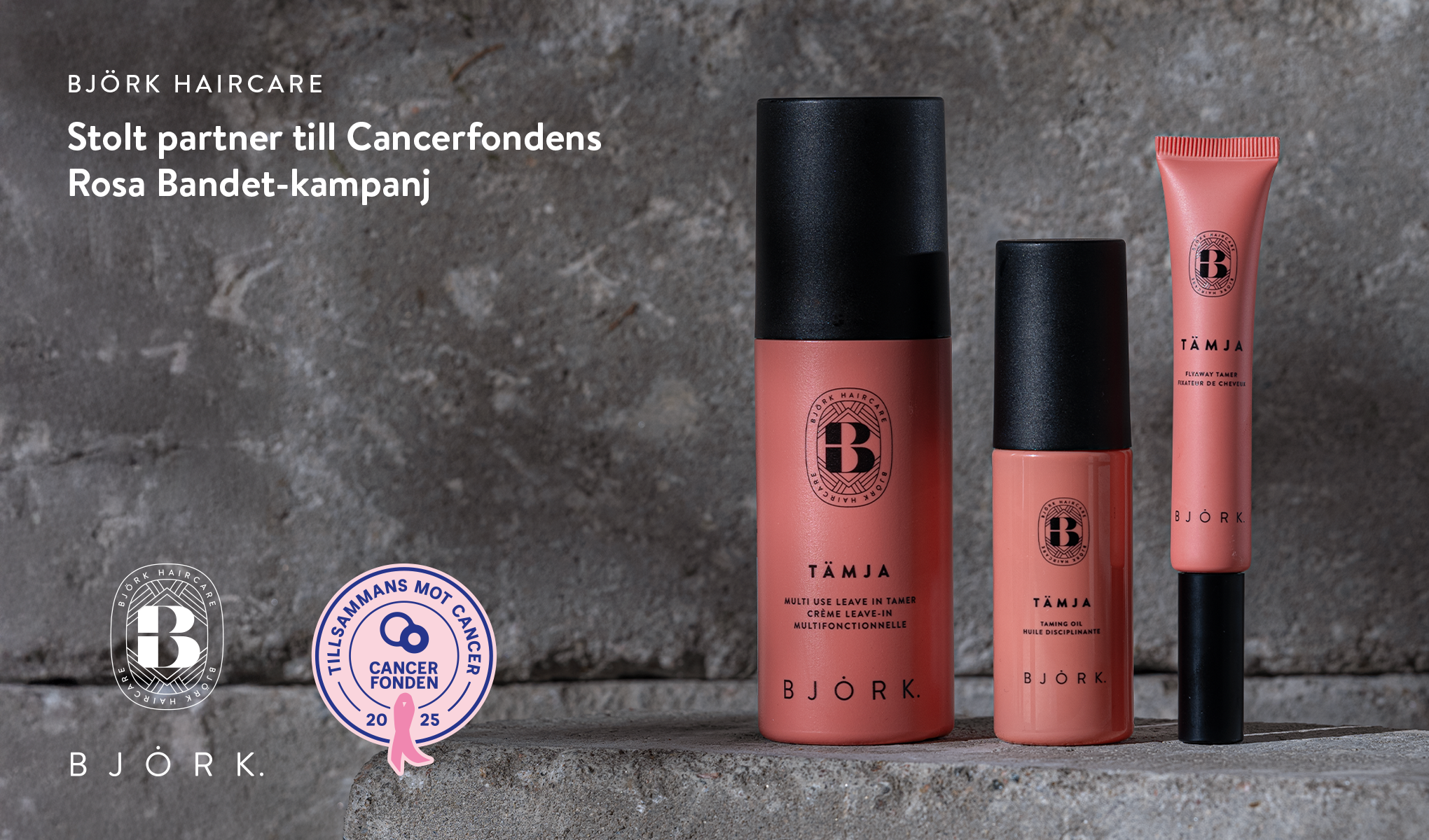 Tre rosa Björk Haircare-produkter framför en grå betongvägg. Texten säger att Björk Haircare är stolt partner till Cancerfondens Rosa Bandet-kampanj.