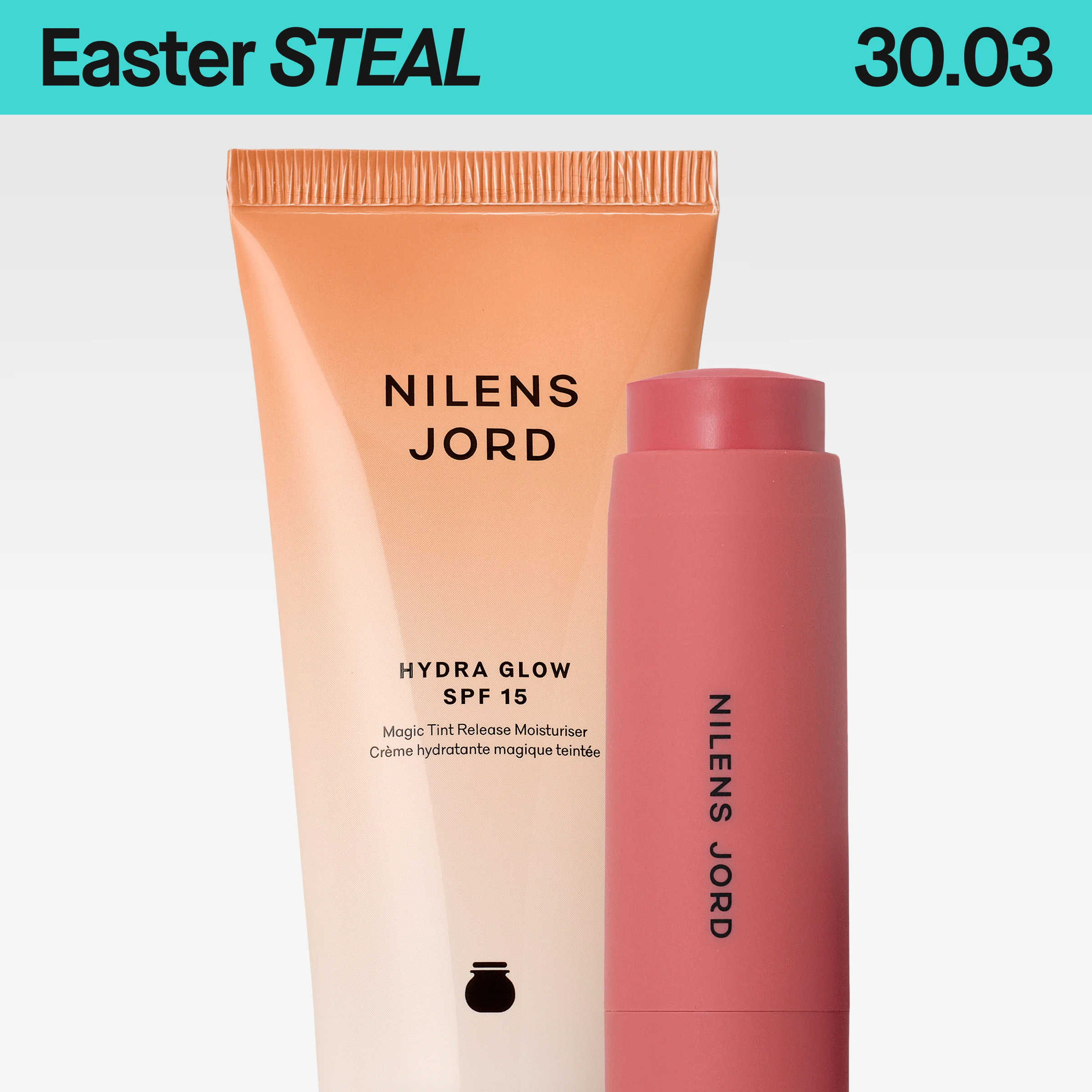 Produktbilde av Nilens Jord Hydra Glow SPF 15 i tube sammen med matchende rosa stickprodukt fra Nilens Jord, mot lys grå bakgrunn.