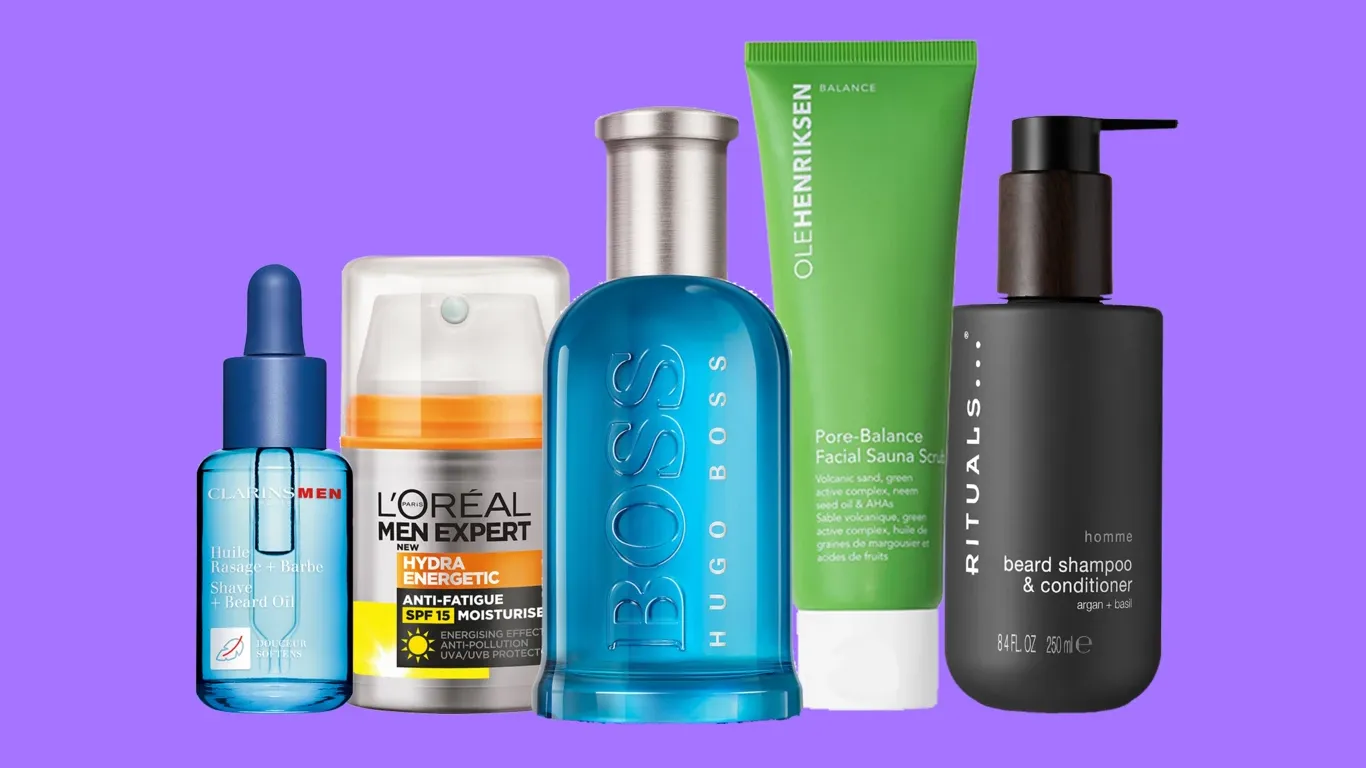 Grooming- och hudvårdsprodukter för män på en lila bakgrund.