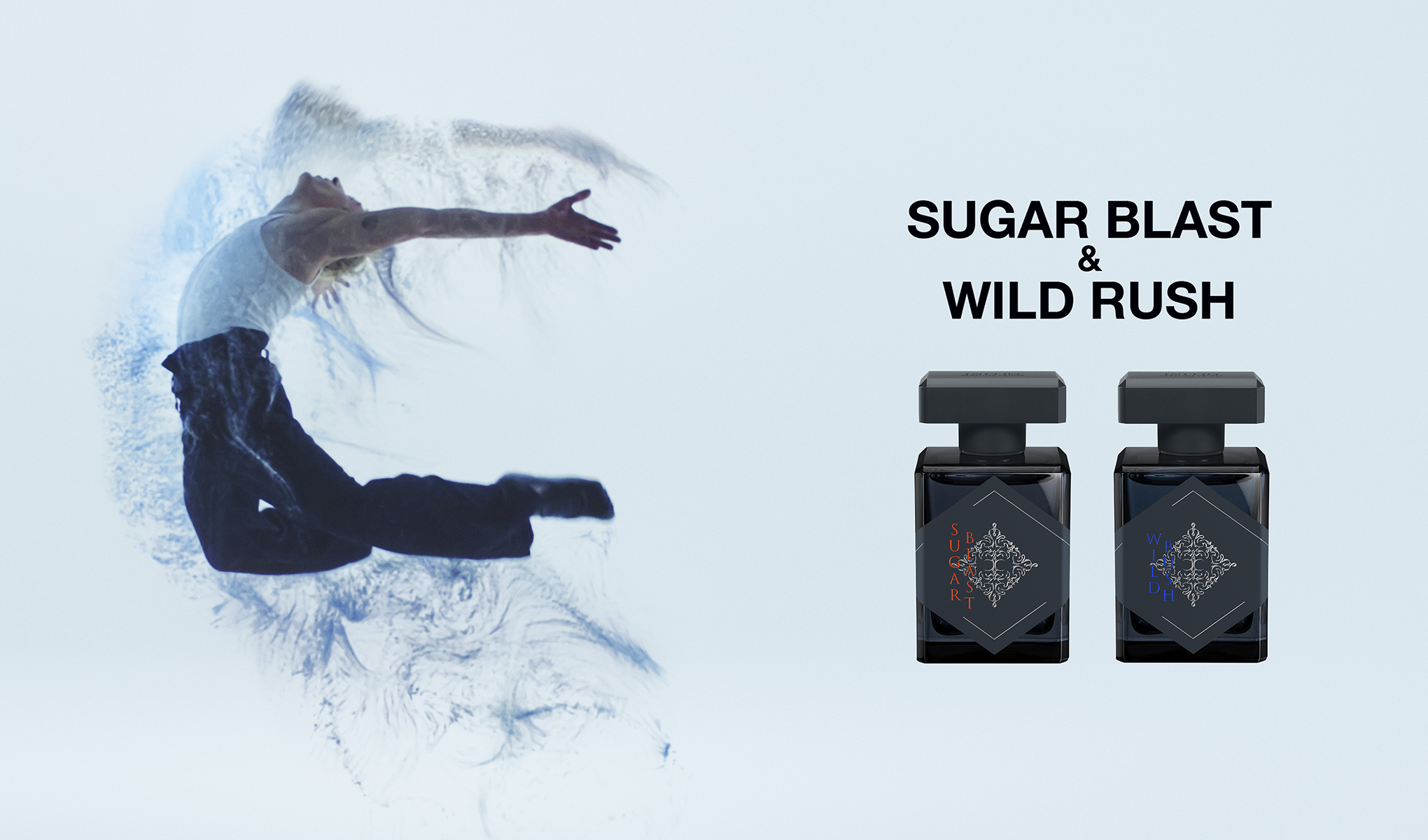 Kampanjbild för INITIO Parfums Privés med texten “SUGAR BLAST & WILD RUSH” och “THE SUPERCHARGED COLLECTION”, två parfymflaskor märkta “Sugar Blast” och “Wild Rush” samt en person som hoppar genom blått pulver.